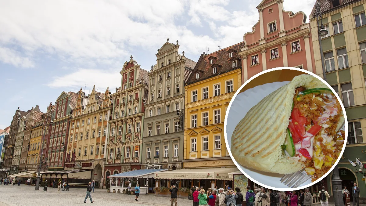 Kolorowe kamienice przy Rynku we Wrocławiu, w kółku knysza z mięsem i warzywami