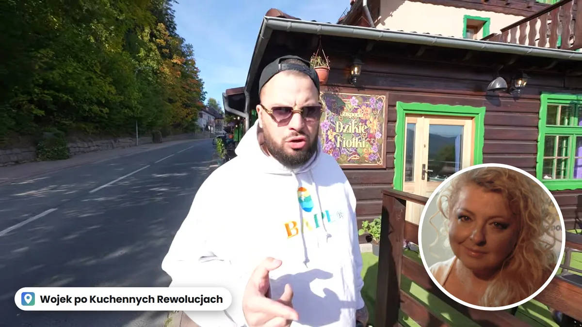 Wojek przed szyldem Gospody Dzikie Fiołki w Karpaczu, w kółku Magda Gessler